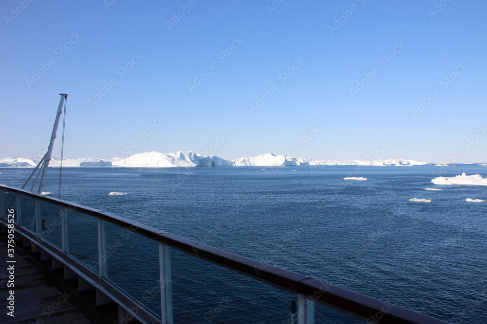 Sailing among the icebergs in Disko Bay, Ilulissat, Greenland.