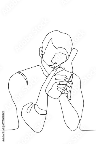 drunk man sits lovingly clutching a bottle of alcohol. one continuous line drawing concept alcoholic / drink addict cannot physically break away from alcohol