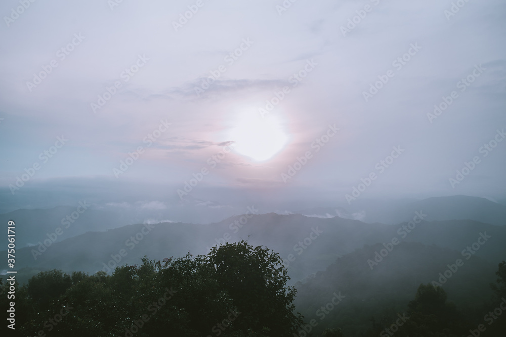 Naklejka premium Sunset Mountain on blue sky