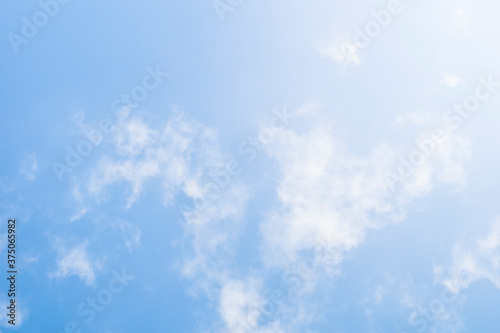 light blue sky with light clouds