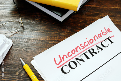 Canvastavla Contract with handwritten word unconscionable on the table.