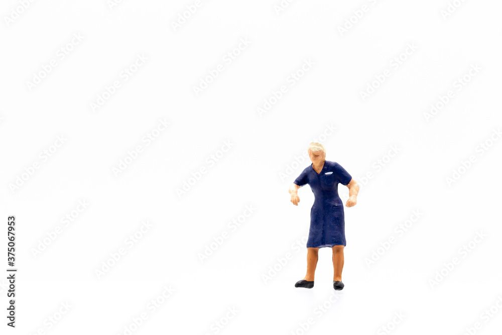 Miniature people standing on white background and copy space for your text Miniature people standing on white background and copy space for your text
