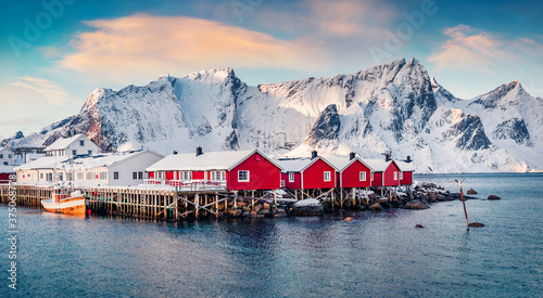 Captivating winter cityscape of small fishing town - Hamnoy, Norway, Europe. Stunning morning seascape of Norwegian sea. Iconic landscape of Lofoten Island. Life over polar circle.