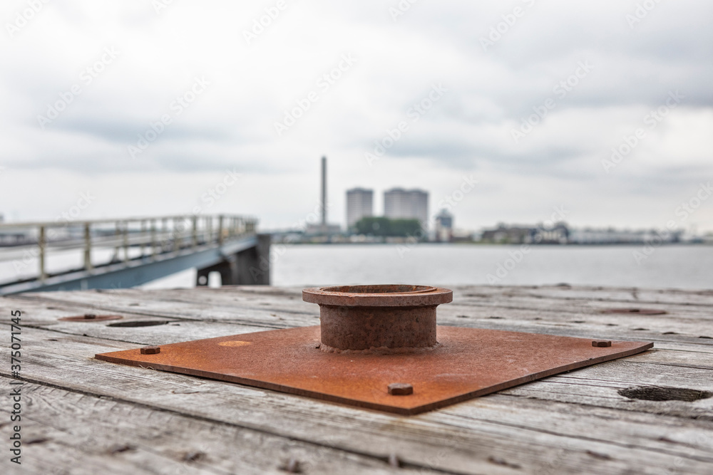 iron plate on wooden construction in the port of Rotterdam 