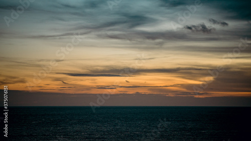 sunset over the sea © Thanarat