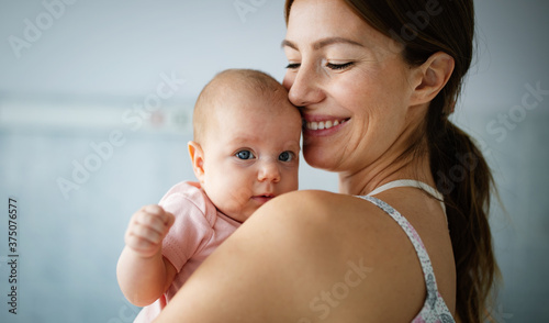 Portrait of a mother with her newborn baby
