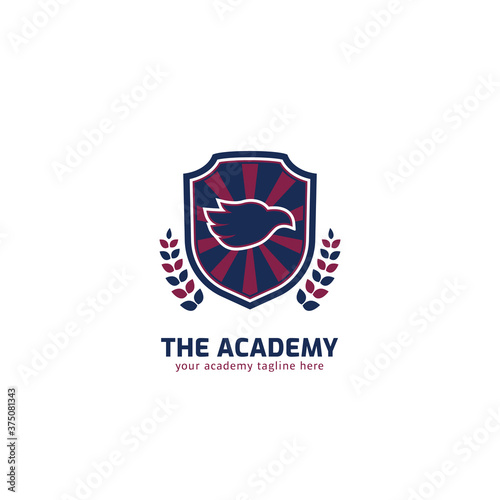 Academy logo with eagle head mascot silhouette inside shield vector emblem badge Free Download Academy logo with eagle head mascot silhouette inside shield vector emblem badge - GFXLoad