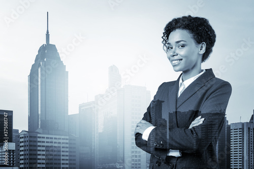 Photography Smiling black African American business woman in suit in crossed arms pose