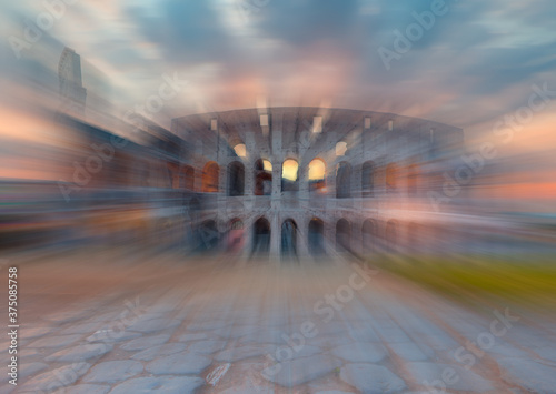 Abstract background of Amazing sunrise at Rome Colosseum (Roma Coliseum), Rome, Italy © muratart