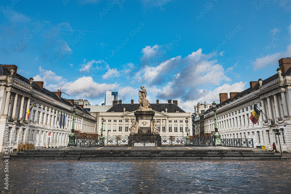 Place des Martyrs is a neoclassical square that refers to the martyrs of the Belgian Revolution. Cobbled square of Martelaarsplein features elegant neoclassical architecture - Brussels, Belgium