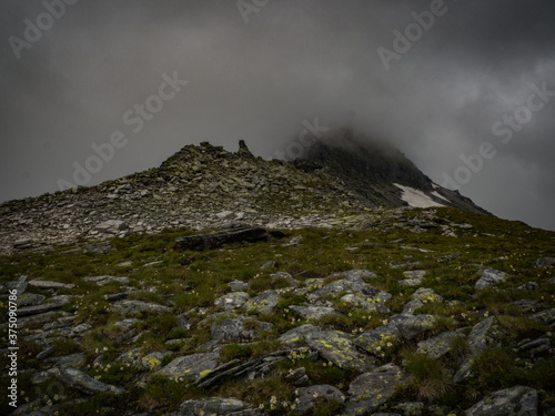 Great views to the peaks and glaciers of the Austrian Alps, Hohe Tauern park. Picturesque and beautiful scene, full of dark clouds and peace in soul. Near Berghotel Rudolfshütte, Austria, Europe. photo