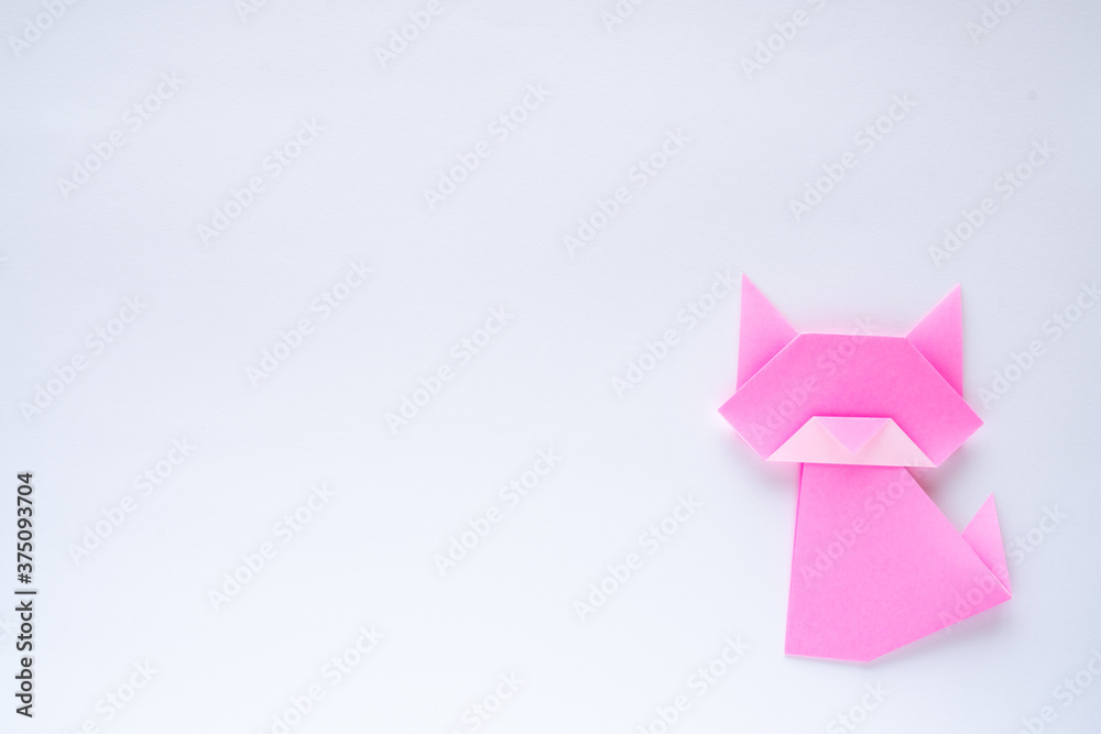 pink origami cat on white background pink origami cat on white background