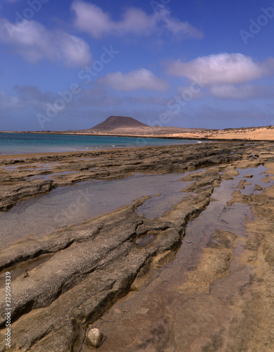 Shallow lagoon Bahia del Salado on La Graciosa, Canary Islands, textures and surfaces