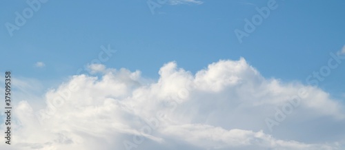 White clouds on a background of blue sky.