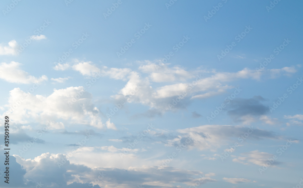 White clouds against the blue sky. White clouds against the blue sky.