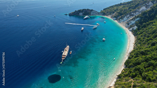 Aerial drone photo of beautiful paradise turquoise sea sandy beach and bay of Gidaki accessible by short hiking in beautiful Ionian island of Ithaki or Ithaca, Greece