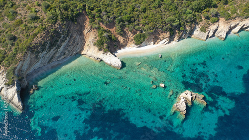 Aerial drone photo of beautiful paradise turquoise sea sandy beach and bay of Gidaki accessible by short hiking in beautiful Ionian island of Ithaki or Ithaca, Greece