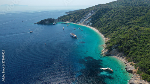 Aerial drone photo of beautiful paradise turquoise sea sandy beach and bay of Gidaki accessible by short hiking in beautiful Ionian island of Ithaki or Ithaca, Greece