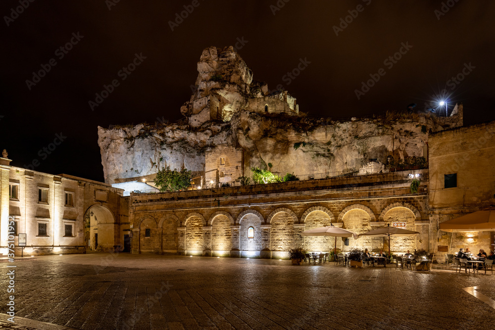  Night view at Church of San Pietro caveoso and on the top of the hill of Church of Saint Mary of Idris in Matera, Basilicata, Italy