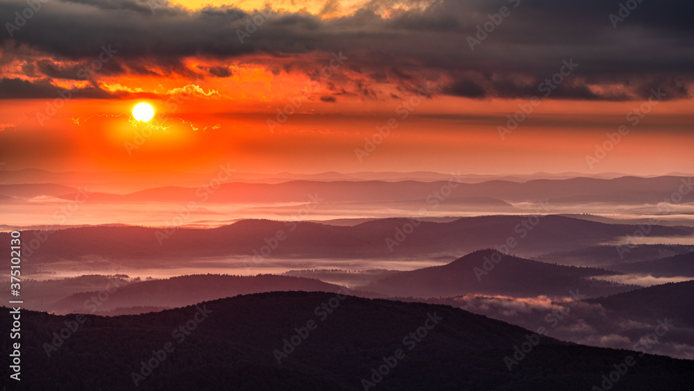 Superb mountain vista. Summer sunrise in the Carpathian Mountains. Bieszczady National Park. Poland.