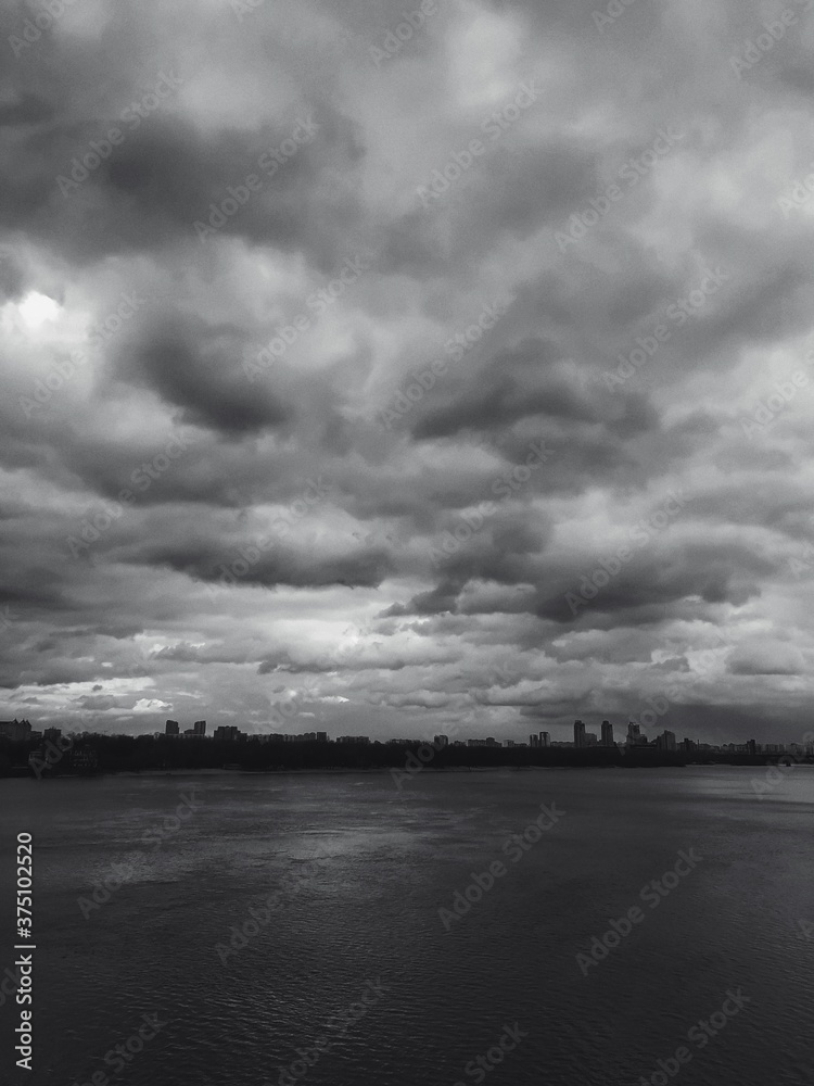Fototapeta premium storm clouds over the river