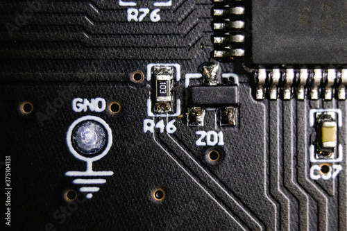 artistic close up for ground test point next to microcontroller stylized