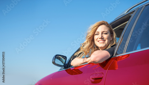 The blonde in the car. Attractive woman drives a car. © Denis Rozhnovsky
