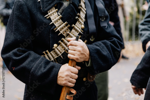 13.10.2019 Vinnitsa, Ukraine: military actors hold weapons of World War II, original guns and pistols. Military reconstruction of guerrilla fighting in Ukraine