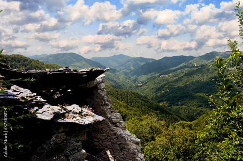 Ruins of abandoned houses in a valley of central appennine photo