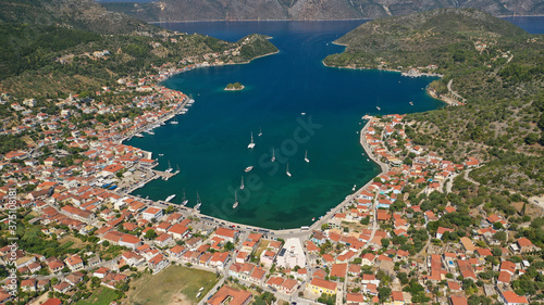 Fototapeta Naklejka Na Ścianę i Meble -  Aerial drone panoramic photo of picturesque village capital and port of Ithaki or Ithaca island called Vathi a safe anchoring for sail boats, Ionian, Greece