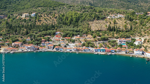 Fototapeta Naklejka Na Ścianę i Meble -  Aerial drone photo of picturesque village capital and port of Ithaki or Ithaca island a safe anchoring for sail boats featuring small islet of Lazareto with small chapel built on it, Ionian, Greece