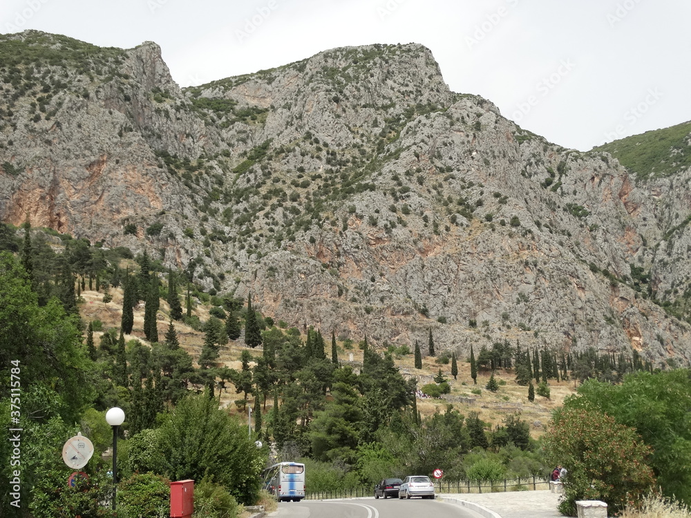 Tourists visit ancient sanctuary Delphi, also called Python in Greece ...
