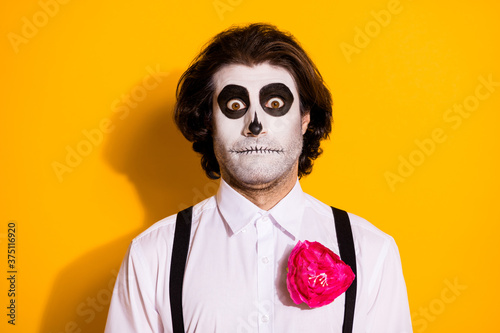 Photo of startled speechless guy ghost shock staring hear bad news bride corpse transfered another cemetery wear white shirt rose death costume suspenders isolated yellow color background photo