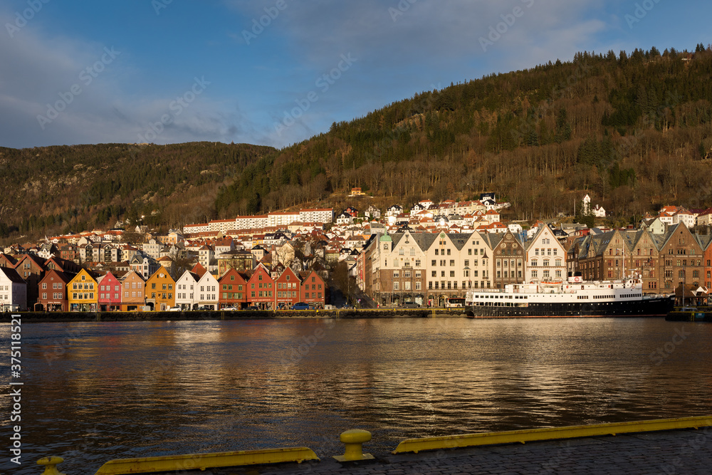 The facades of the old houses in the historical town quarter Bryggen in the city of Bergen, Norway on a sunny day