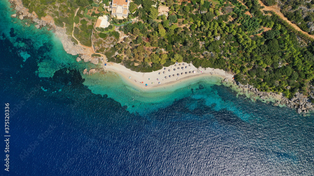 Aerial drone photo of secluded paradise sandy beach of Aspros Gialos or White beach in Ithaki or Ithaca island, Ionian, Greece
