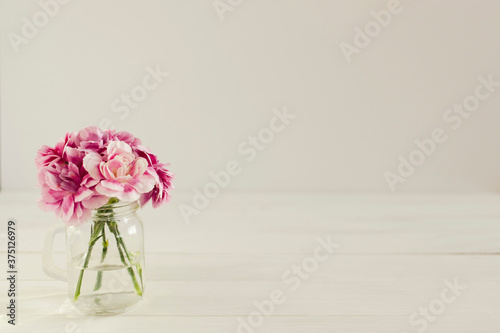 Pink Carnation Flowers in Mini Glass Mason Jar