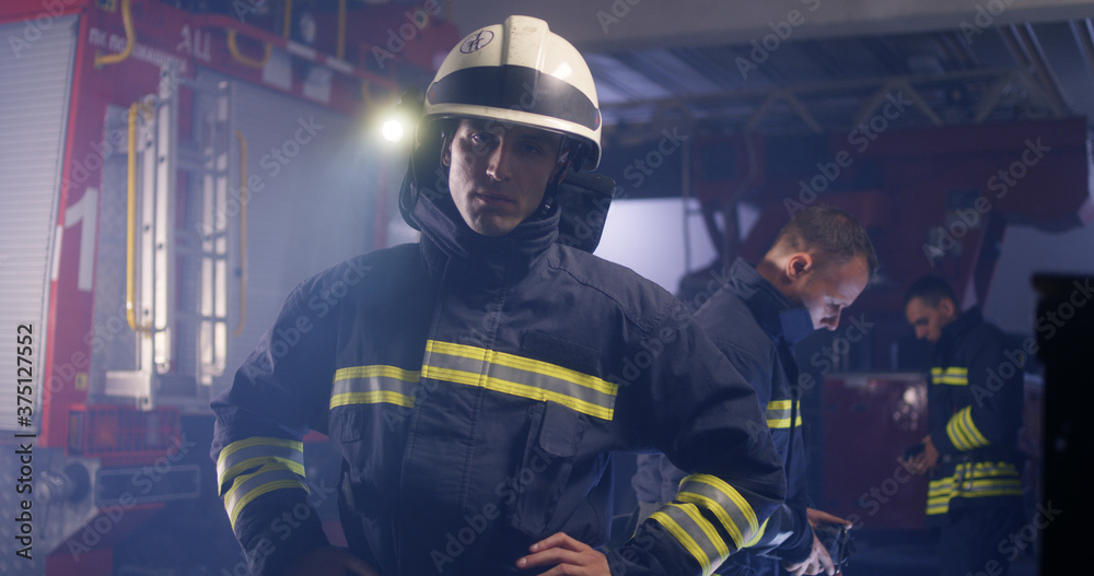 Serious fireman looking at camera Serious fireman looking at camera
