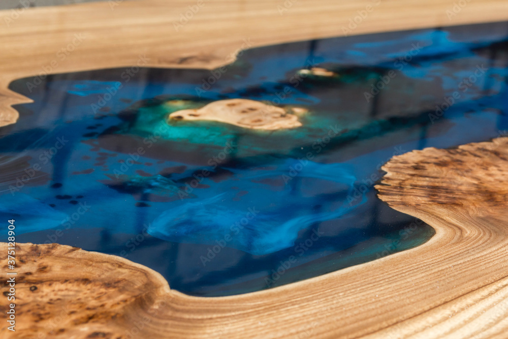 beautiful wooden table made of elm slab and epoxy resin