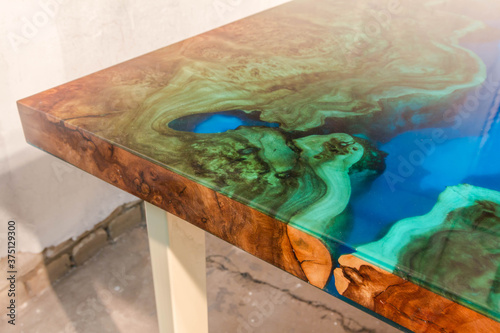 beautiful wooden table made of elm slab and epoxy resin
