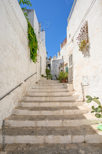 Ostuni, Bari, Italy August 2020, Ostuni is called the white city, people come to visit this old typical city of the Apulia region. © LuEn