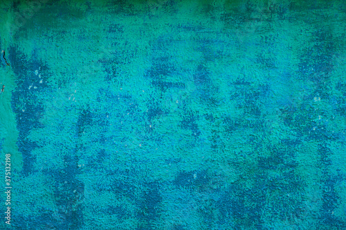 blue turquoise background. old cracked paint