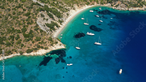 Aerial drone photo of turquoise paradise sandy beach and bay of Filatro a safe sail boat anchorage in Ithaki or Ithaca island  Ionian  Greece
