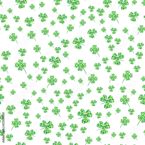Seamless pattern with green mosaic clover leaves. Modern background with repeating elements for packaging, printing, fabric. Vector