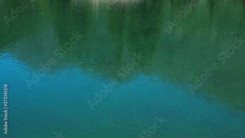 Drone video over a beautiful mountain lake