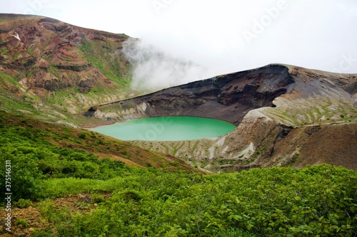 The view of crater lake called "Okama" in Japan.