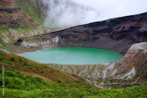 Crater lake in the mountains called 