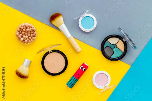 Multicolor pattern of makeup products and colorfull cosmetics. Flat lay top view