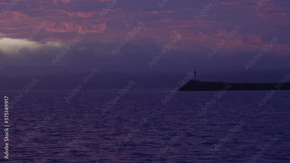 Pre Dawn River and Dramatic Sky and Lighthouse Pre Dawn River and Dramatic Sky and Lighthouse