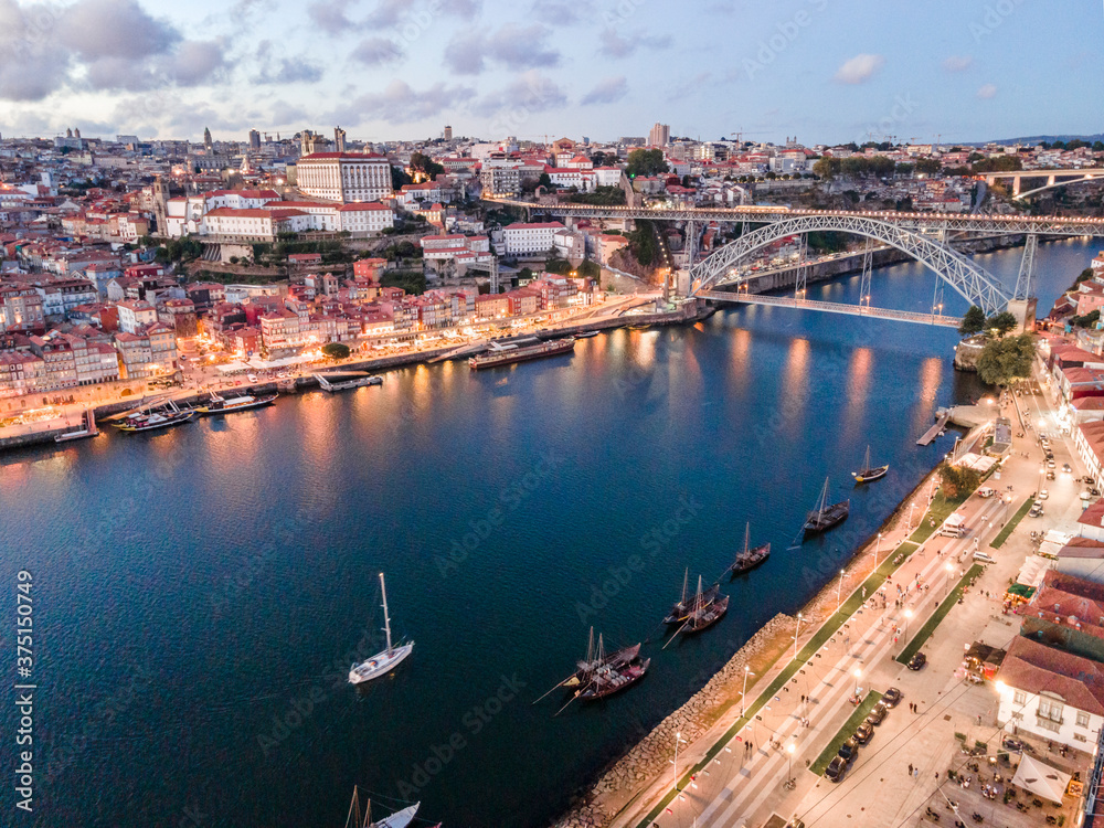 Aerial cityscape of Porto and Vila Nova da Gaia with connecting bridge, Portugal