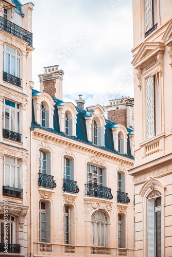 Antique building view in Paris city, France. © ilolab